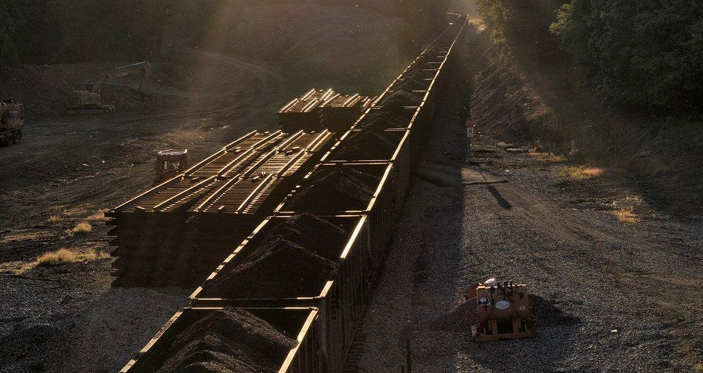 courier journal: Some pay restored for laid-off miners who've blocked $1 million train